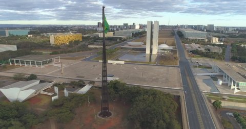 BRASILIA, DISTRITO FEDERAL/ BRAZIL - July 2019: Aerial of National Congress and the Tancredo Neves Pantheon of the Fatherland and Freedom cenotaph in the centre of the city with the Brazilian national