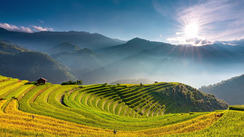 4K Time lapse of Sunrise over Terraced rice fields with lens flare, Mu Cang Chai, Yen Bai, Vietnam
