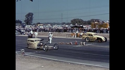 CIRCA 1950s - Various hot rods are driven, including a roadster, a Thunderbird, a Corvette and a Chevrolet, in the National Championship Drag Races.