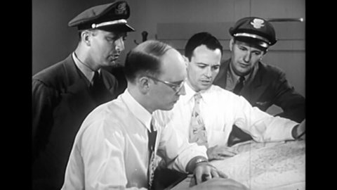 CIRCA 1950s - A pilot and co-pilot check in with a meteorologist to find out the weather forecast for their flight in 1957.