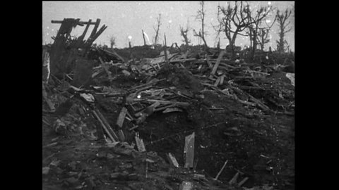 CIRCA 1910s - A ruined church, destroyed trenches, wreckage and graves are shown in France, during World War 1, in 1917.
