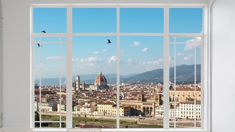  Florence cityscape as seen from a white window while birds are flying. It is seen the river and cathedral of Santa Maria del fiore and appennines and sky in background