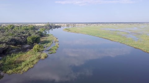 Okavango delta Aerial landscape in Namibia and Angola border. River with shore and green vegetation after rainy season. Africa aerial landscape.