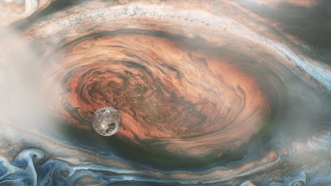 Ganymede, one of the four Galilean Moons, orbiting Jupiter and passing over the Great Red Spot. Elements of this Video furnished by NASA. 