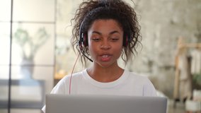 Portrait of young black woman having a video call. Girl teleworking.
