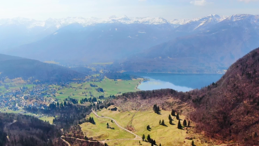 Viewpoint in Slovenia looking over Lake Bohinj with a cloud inversion. Mountains in the background from Triglav National Park.