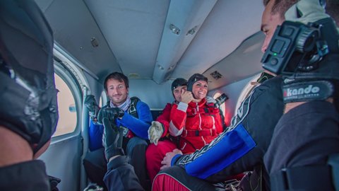 Libelice / Slovenia - 08 20 2019: Excited group of skydivers gearing up to jump from plane 