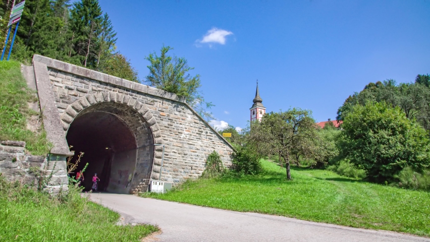 Family biking and enjoying themselve exploring the tunnels at Gornji Dolic, Strekna.