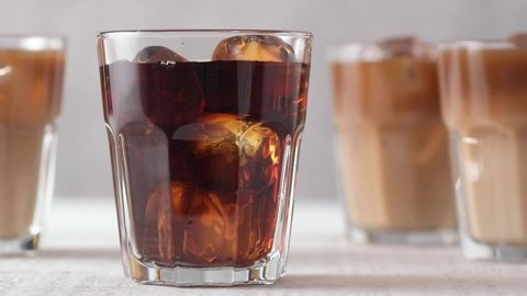 Pouring Cold Brewed Coffee over Ice