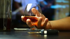man drinking  whisky  at  bar and  taking car key from table, Don't drink and drive concept. - Powered by Shutterstock - Get 15% off with code: PIKWIZARD15