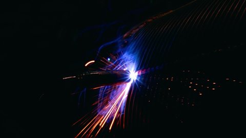 metal welding using a semi-automatic gas-shielded welding machine on a production line