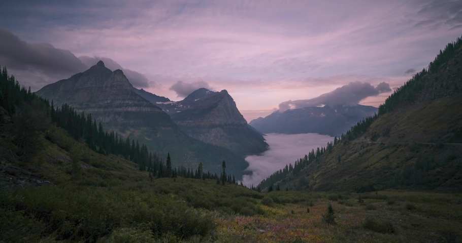 Glacier National Park is a wilderness area in Montana's Rocky Mountains, with glacier-carved peaks and valleys running to the Canadian border. Royalty-Free Stock Footage #1059797420