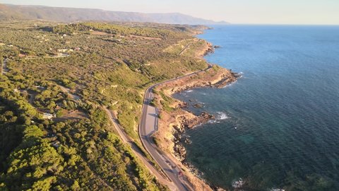 footage from the drone of the coast of north Sardinia near Alghero at sunset