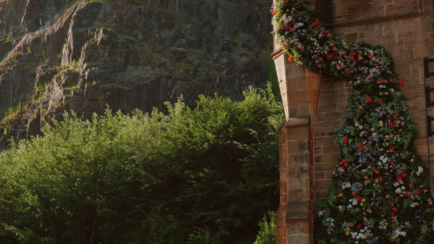 Close-up of Edinburgh Castle in Scotland, UK seen from Grassmarket. The castle dates back to the reign of David I in the 12th century