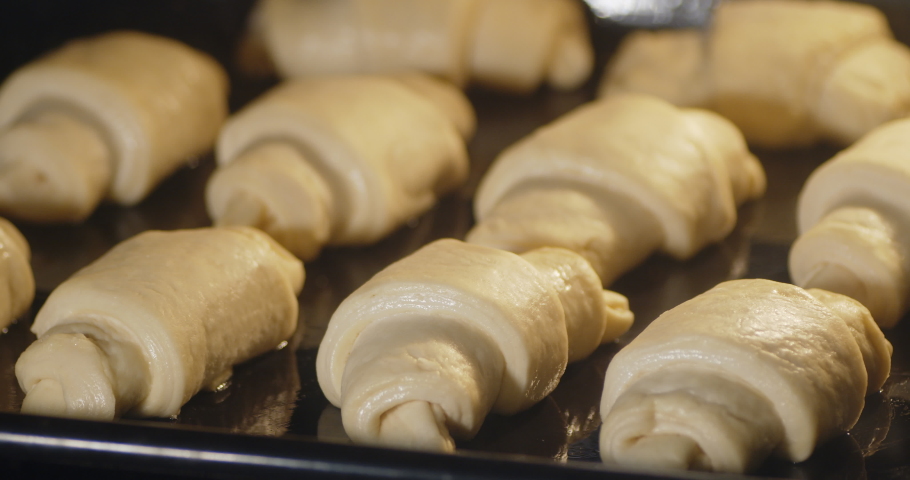 Timelapse croissants are baked in the oven. High quality 4k footage | Shutterstock HD Video #1059826532
