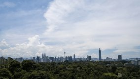Kuala Lumpur, Malaysia - Time lapse during afternoon showing the city as the background. Ultra wide view of the city is mesmerizing with the movement of clouds. 4k resolution.