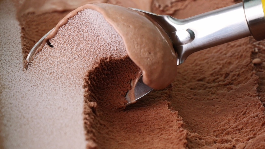 Pouring Melted Surface chocolate ice cream. Royalty-Free Stock Footage #1059844124