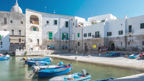 Timelapse 4k, Monopoli province of Bari in Puglia south of Italy. Tourists walk in the historic center of the city