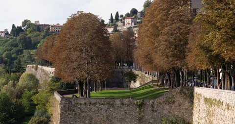 Close up time lapse of the wall of Bergamo upper city on a fall afternoon.