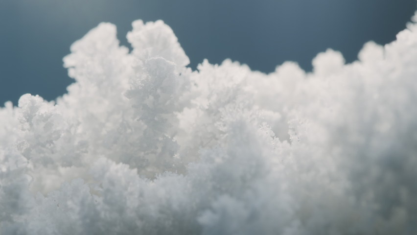 Macro shot of growing ice crystals in 4k, snow crystal, frost, growing cells