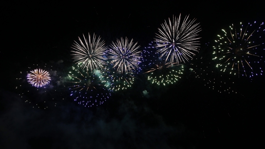 Close up slow motion of colourful Abstract futuristic fireworks show night sky | Shutterstock HD Video #1059866927