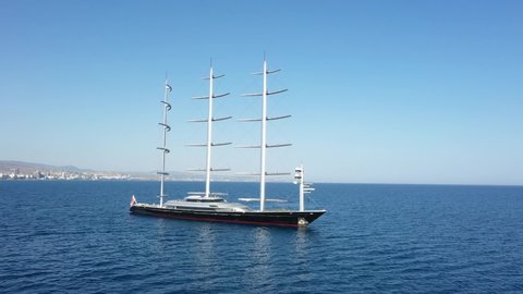 Flying around a large sailing yacht that is located near the Cyprus coast in the city of Limassol. Sailing yacht, four-masted yacht, sailing ship