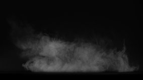 Sand floating and lingering from left side to right side over a black background shot at 60fps from the Sahara collection - Dust VFX Video Element.