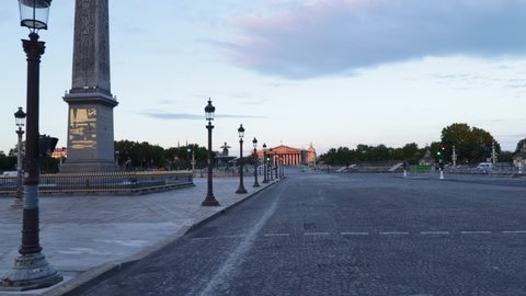 Place de la concorde empty street during early morning with nobody in Paris, wide truck shot