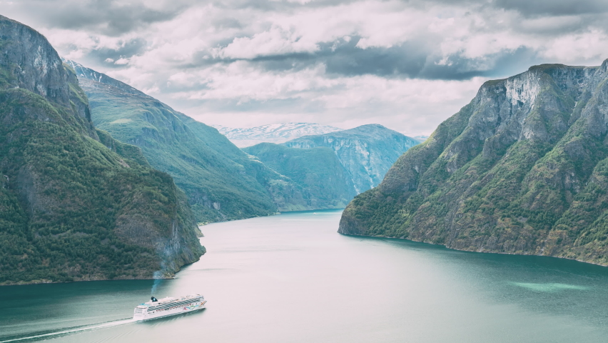 Aurland, Sogn And Fjordane Fjord, Norway. Amazing Summer Scenic View Of Sogn Og Fjordane. Ship Or Ferry Boat Liner Floating In Famous Norwegian Natural Landmark And Popular Destination In Summer Day. Royalty-Free Stock Footage #1059895841