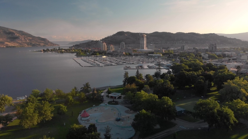 Aerial footage of Downtown Kelowna on Lake Okanagan at sunrise with beautiful light. 4K 24FPS.