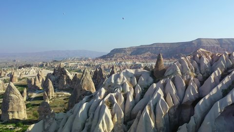 Cappadocia landscape with fairy chimney rock formations, forward aerial