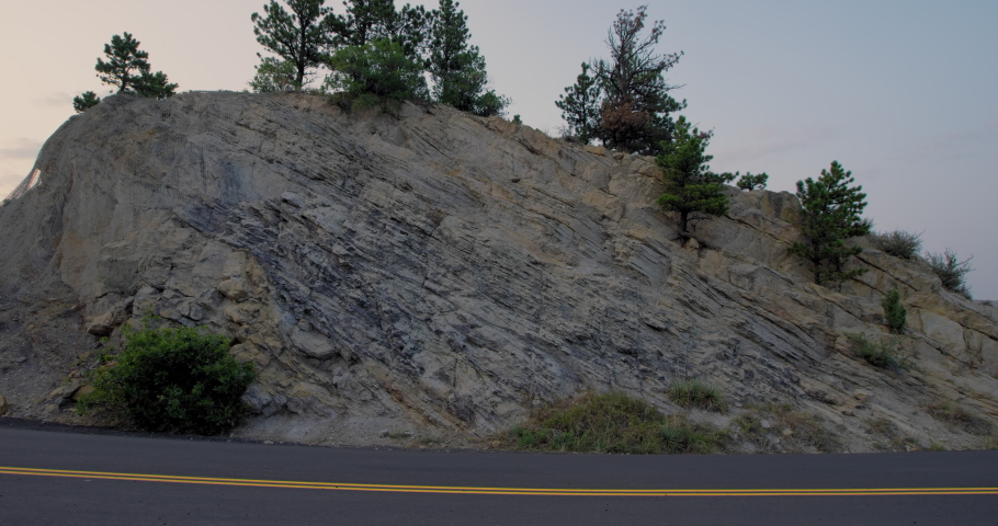 Empty road during sunset along Dinosaur Ridge near Red Rocks in Colorado
