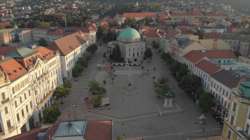 Aerial / drone footage of Mosque of Pasha Qasim, Pécs, a major cultural center of Hungary, on the slopes of the Mecsek mountains, administrative and economic center of Baranya County