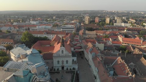Drone footage of downtown Pécs, the fifth largest city of Hungary, a major cultural center, on the slopes of the Mecsek mountains, administrative and economic center of Baranya County