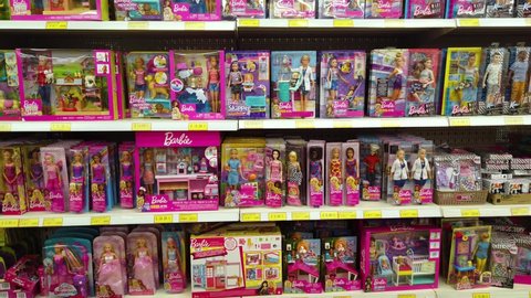Crete Island, Greece - October, 17, 2019. Toy shop. Large supermarket for boys and girls. Shelves with dolls, cars and other toys.