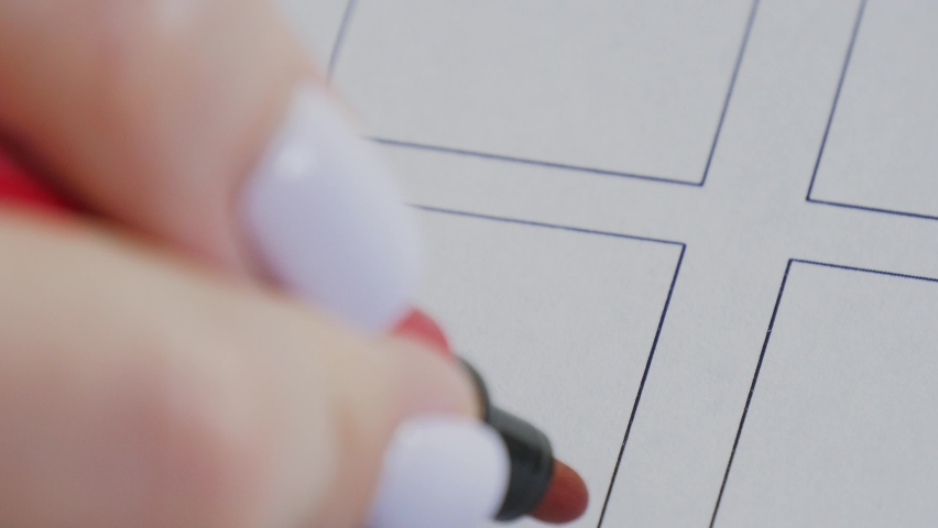 Female hand draws a red cross in vote checkbox. Election and democracy concept video
