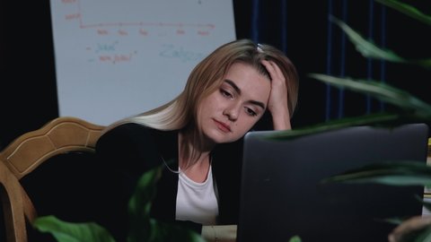 Frustrated young business woman feel stressed look at computer screen worried of problem read bad online news receive failed exam results concept sit at home office table
