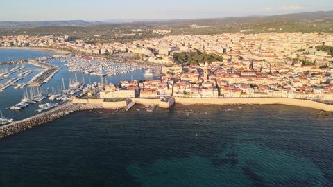 
Footage from the drone of the historic center of Alghero Sardinia from the sea at sunset