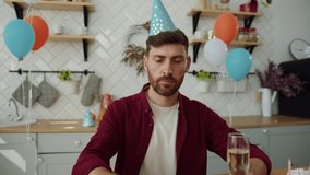 Portrait of positive bearded guy congratulating on webcam holding glass of drink celebrating birthday party with two friends making surprise cheering. Togetherness. Holiday concept.