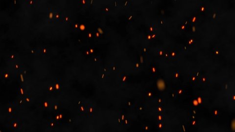 Closeup of burning hot bonfire fire sparks. Fire Particles over black background with smoke. Flying Embers from fire
