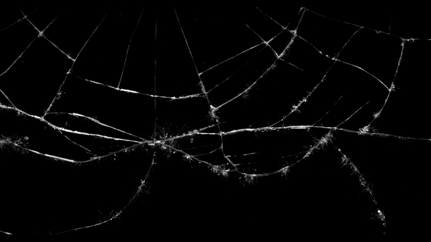 Effect of a big glass shattering in to pieces and falling over a black background from the Fragment collection - Glass VFX Video Element. Royalty-Free Stock Footage #1059940943