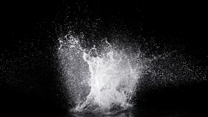 Effect of multiple water splashes from the center over a black background from the Abyss collection - Water VFX Video Element.
