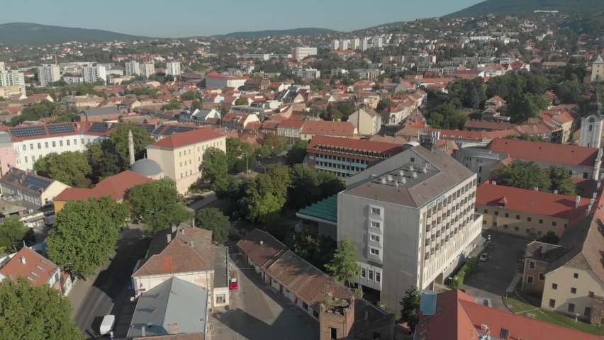 Aerial / drone footage of the Jakovali Hassan Mosque in Pécs, the fifth largest city of Hungary, a major cultural center of Hungary, on the slopes of the Mecsek mountains, in Baranya County