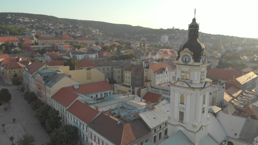 Aerial / drone footage of Széchenyi square, Pécs, a large city of Hungary, a major cultural center, on the slopes of the Mecsek mountains, administrative and economic center of Baranya County