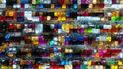 Artful and colorful top down aerial of shoppers at a Thai night market