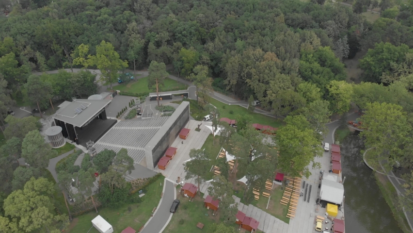 Aerial / drone footage of the open air theater in Debrecen, second largest city and a major cultural center of Hungary, located in the Northern Great Plain region