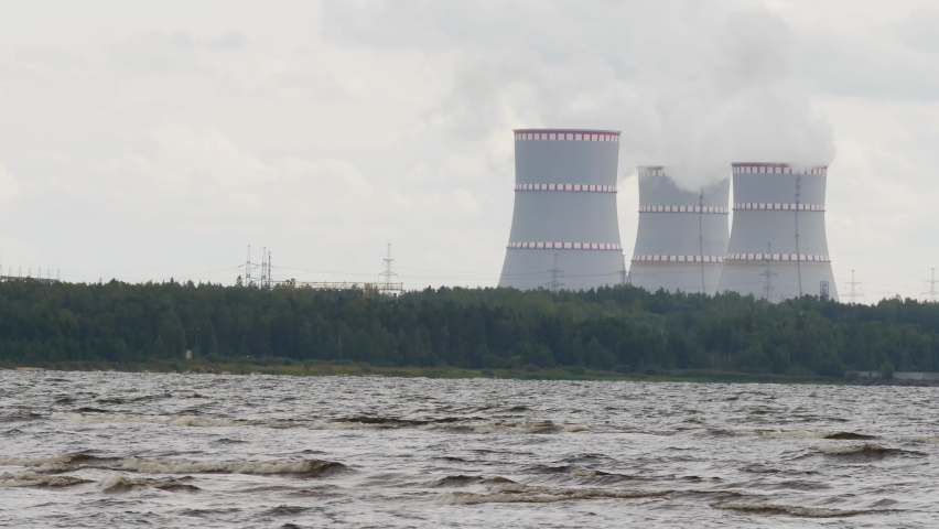 Smoking nuclear power plant industrial landscape. Air pollution and climate change concept video