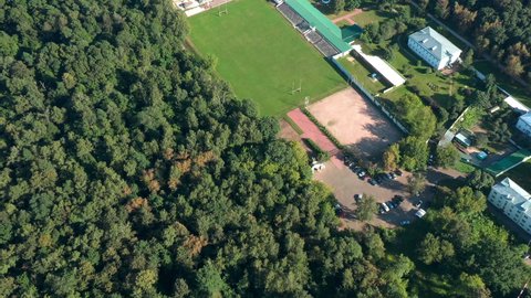 Training pitch for american football in the park. Top down view from drone.