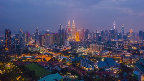aerial view hyperlapse 4k video of Kuala Lumpur city center view during dawn overlooking the city skyline in Federal Territory, Malaysia.