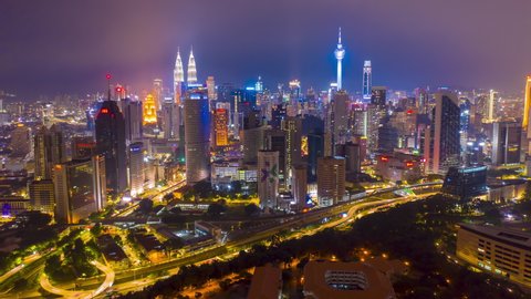 2019/12/28 KUALA LUMPUR, MALAYSIA. aerial view hyperlapse 4k video of Kuala Lumpur city center view during dawn overlooking the city skyline in Malaysia. petronas twin towers hyper lapse.